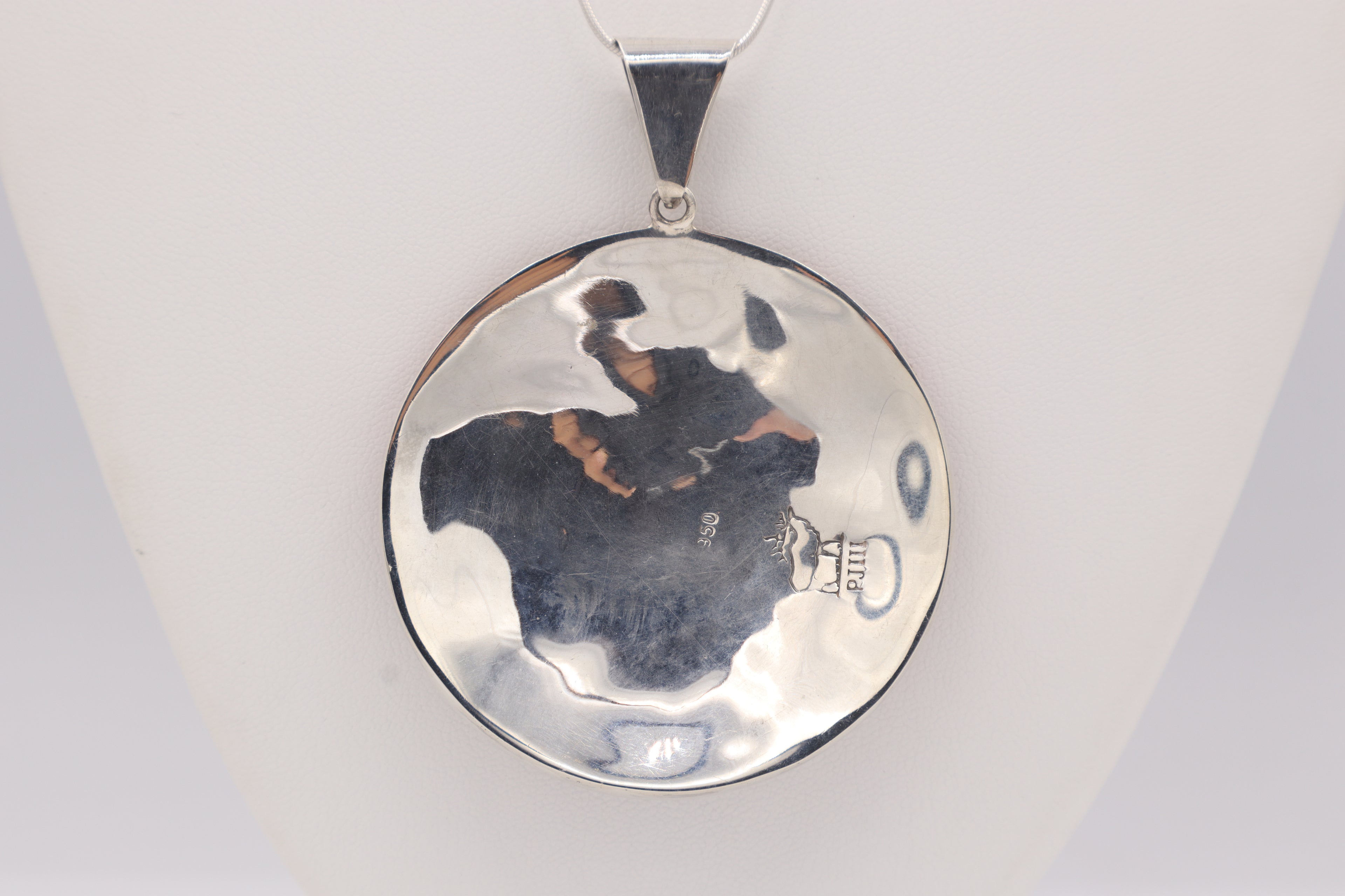 Sun Wheel Silver Inlay Pendant